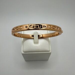 Coach F59083 Signature C hinged bangle/ bracelet in ROSE GOLD tone metal!